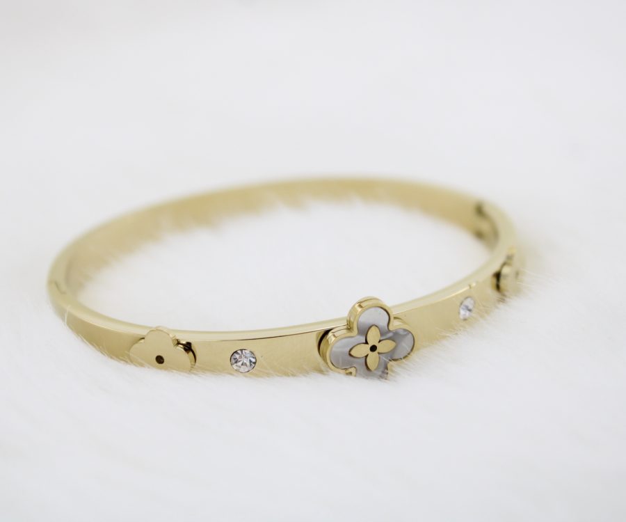 צמיד קשיח מוזהב בשילוב פרח