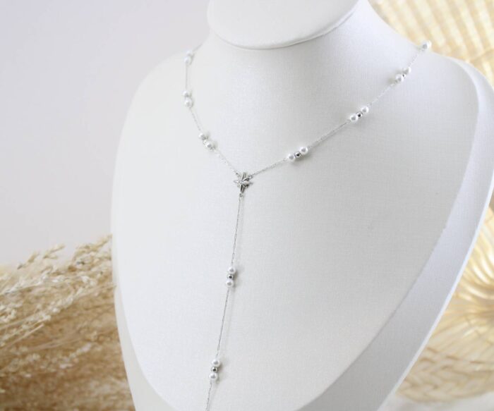 שרשרת נופלת בשילוב כוכב הצפון ופנינים