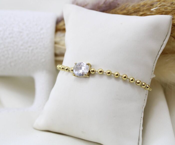 צמיד עניבה בשילוב אבן גדולה בציפוי זהב